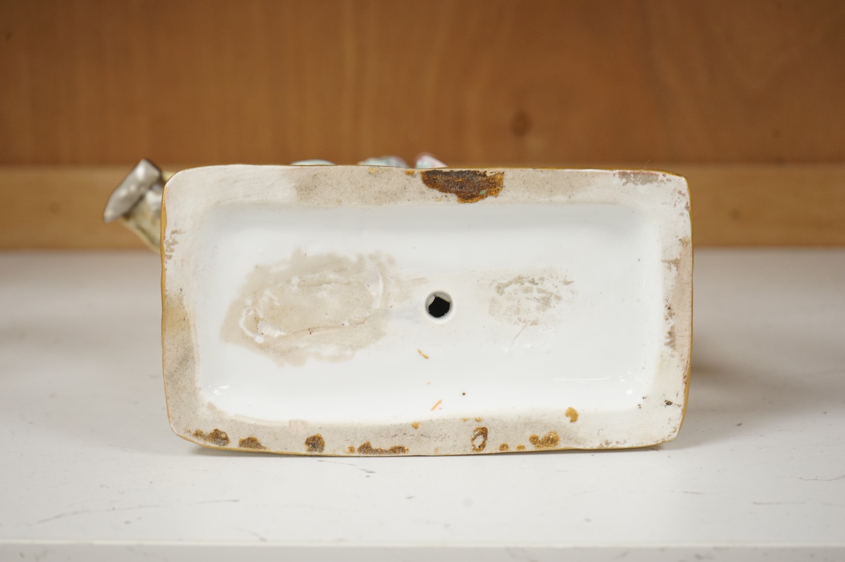 A 19th century German porcelain group of Count Von Bruhl's Tailor, 19cm wide